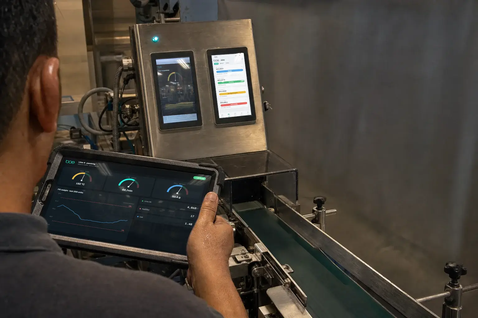 A tablet at the machine showing gauges and limits for each unit